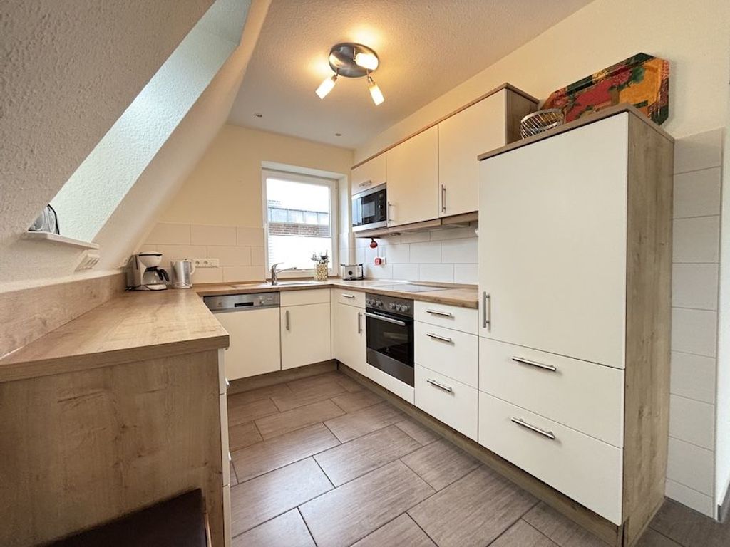 Living room with integrated kitchen area