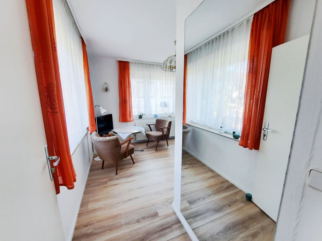 Wohnzimmer mit Pantry Küche
