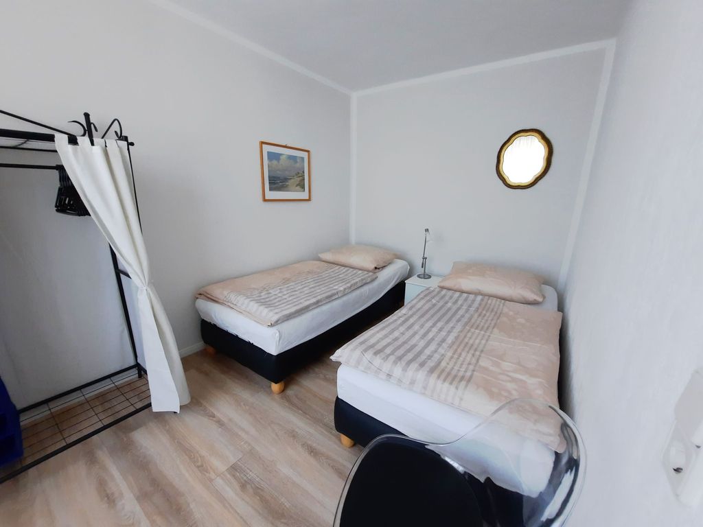 Schlafzimmer mit 2 Einzelbetten