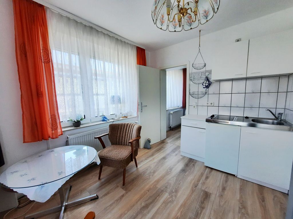Wohnzimmer mit Pantry Küche