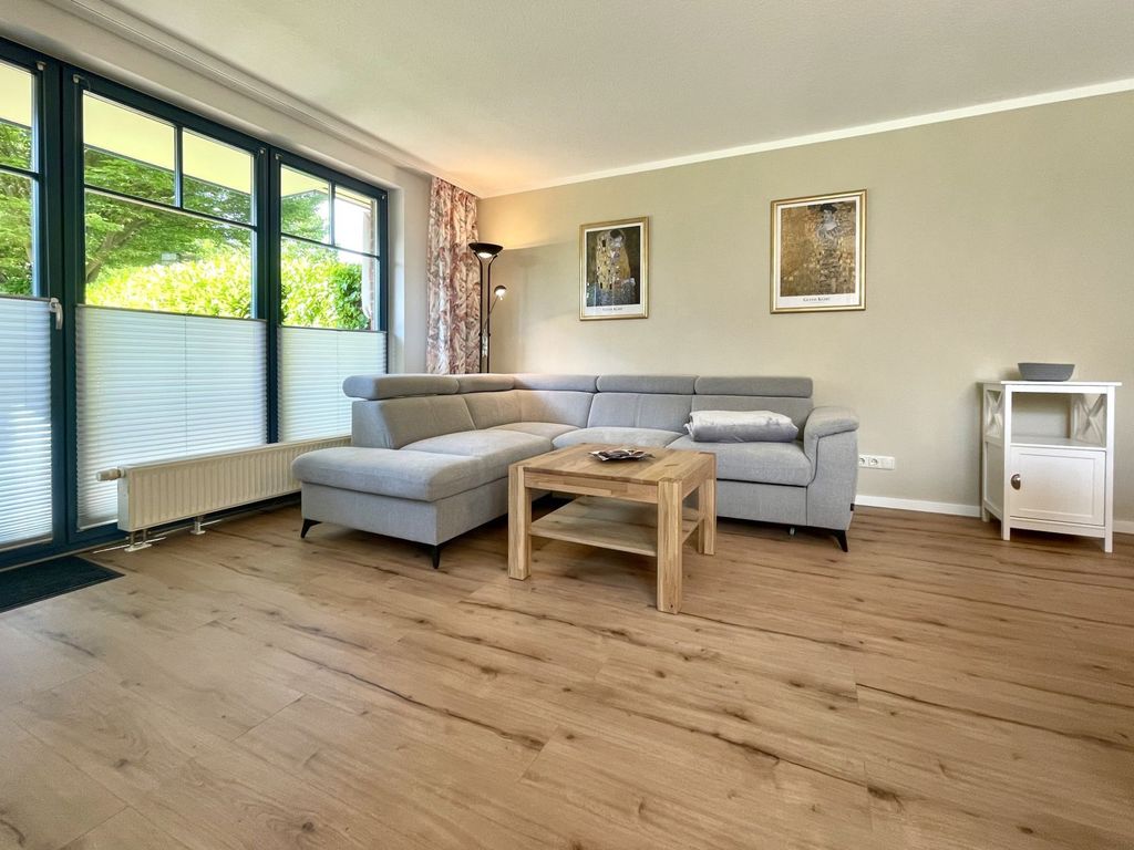 Papillon 7/1 - Blick auf den gemütlichen Wohnbereich mit einem Schlafsofa