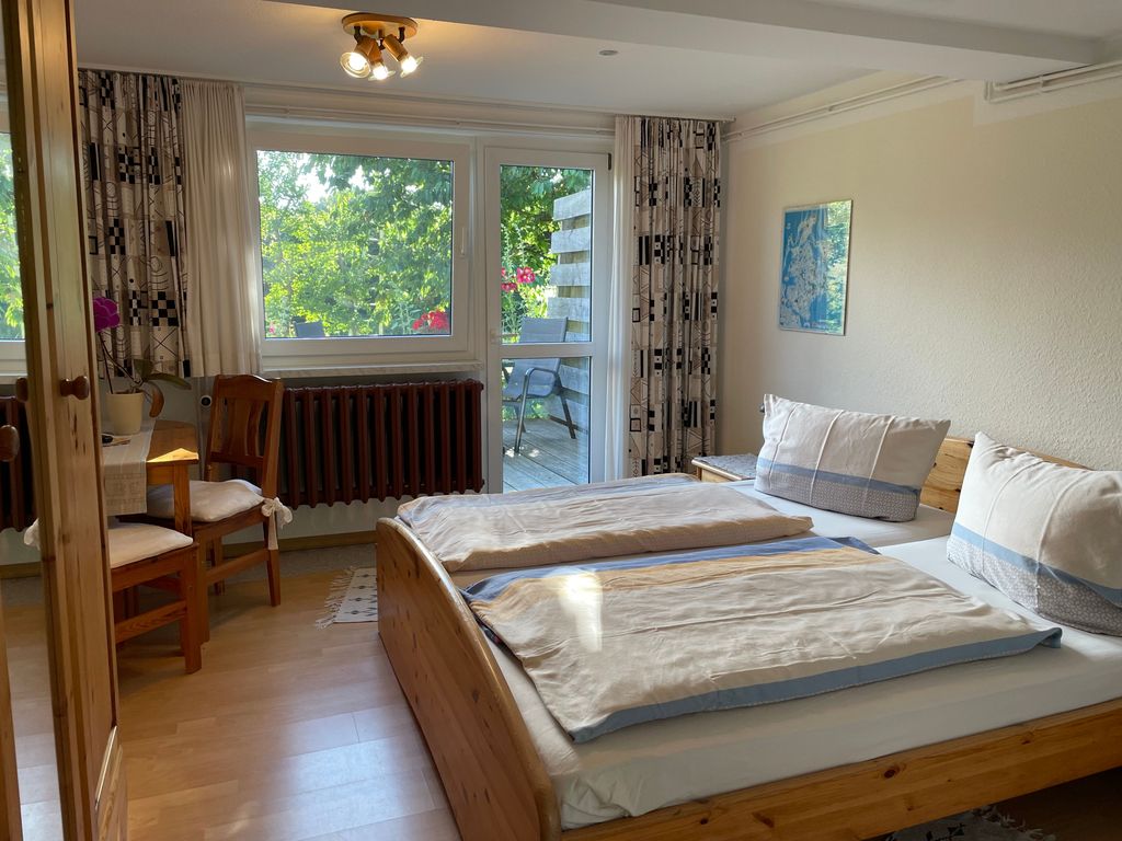 Ferienzimmer mit Ausgang zur Terrasse