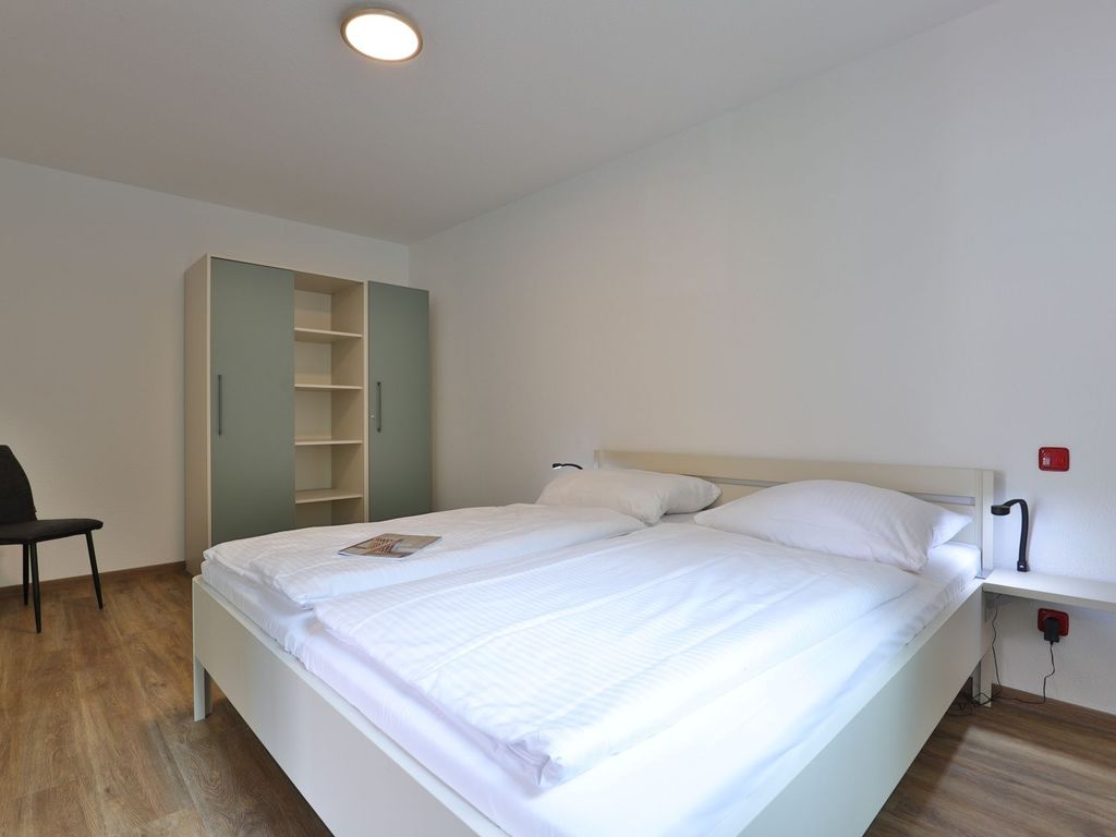 Waldfrieden Whg. 5 - Blick in das Schlafzimmer mit einem Doppelbett