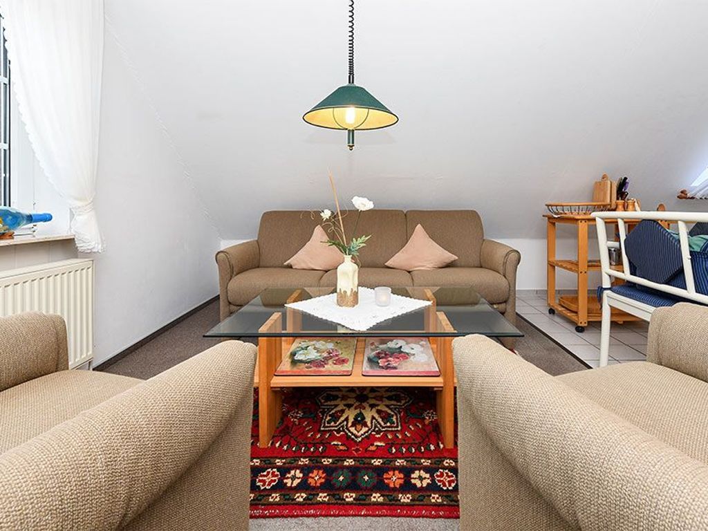 Wohnzimmer mit integriertem Küchenbereich