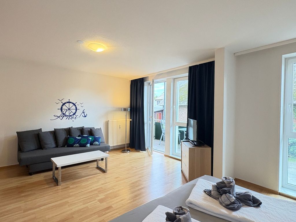 Wohnzimmer mit Balkon