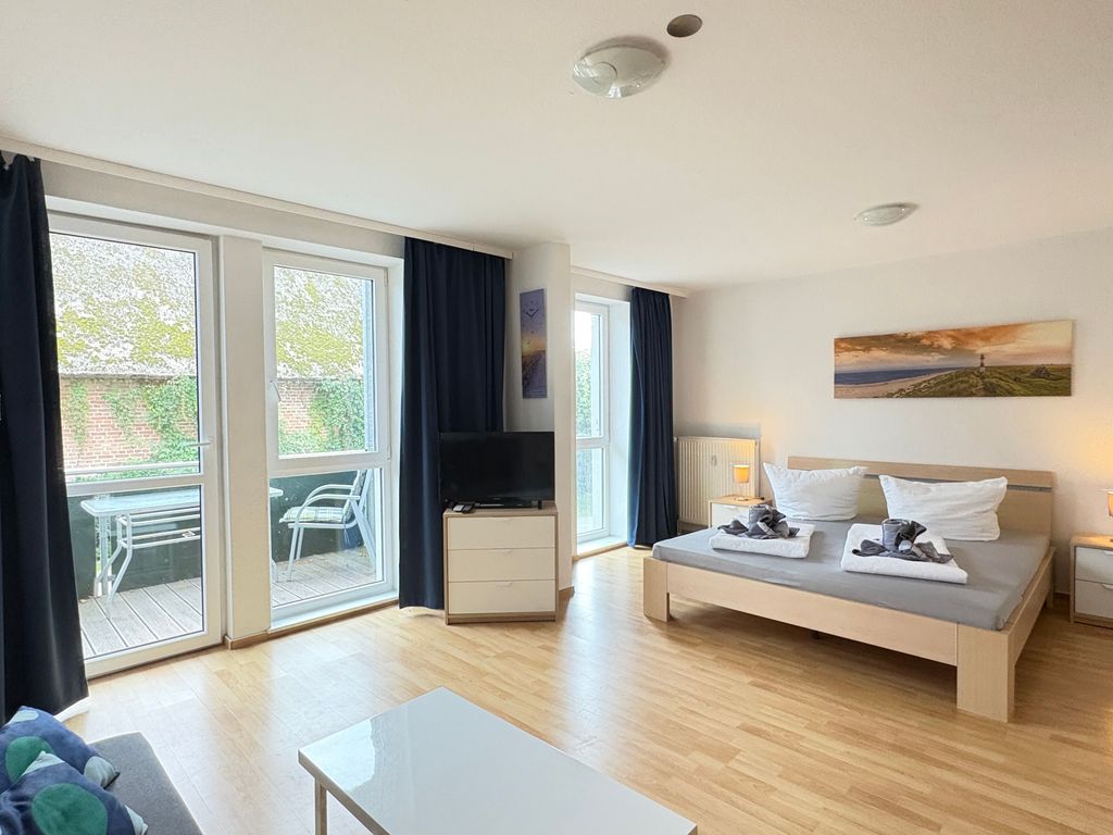 Wohnzimmer mit Balkon