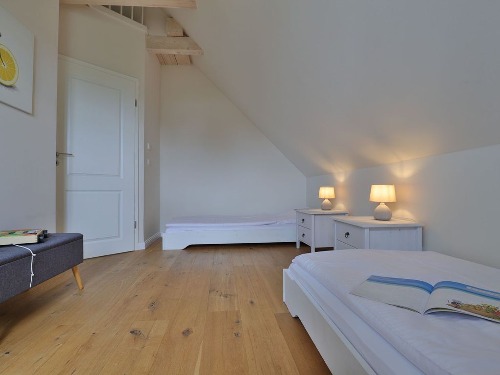 Lillesand - Blick in das Schlafzimmer im Obergeschoss mit 2 Einzelbetten