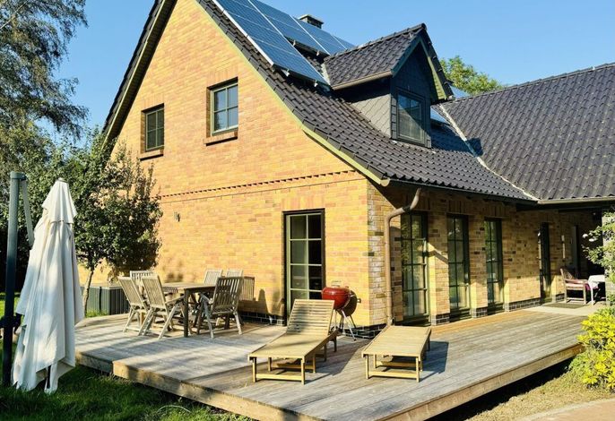 Photo großes Ferienhaus mit Kamin in ruhiger Naturlage auf Rügen 1