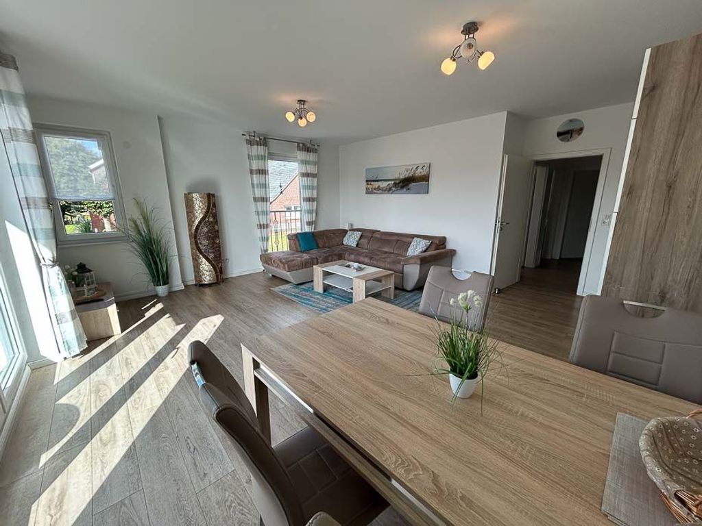 Wohnzimmer mit integriertem Küchenbereich
