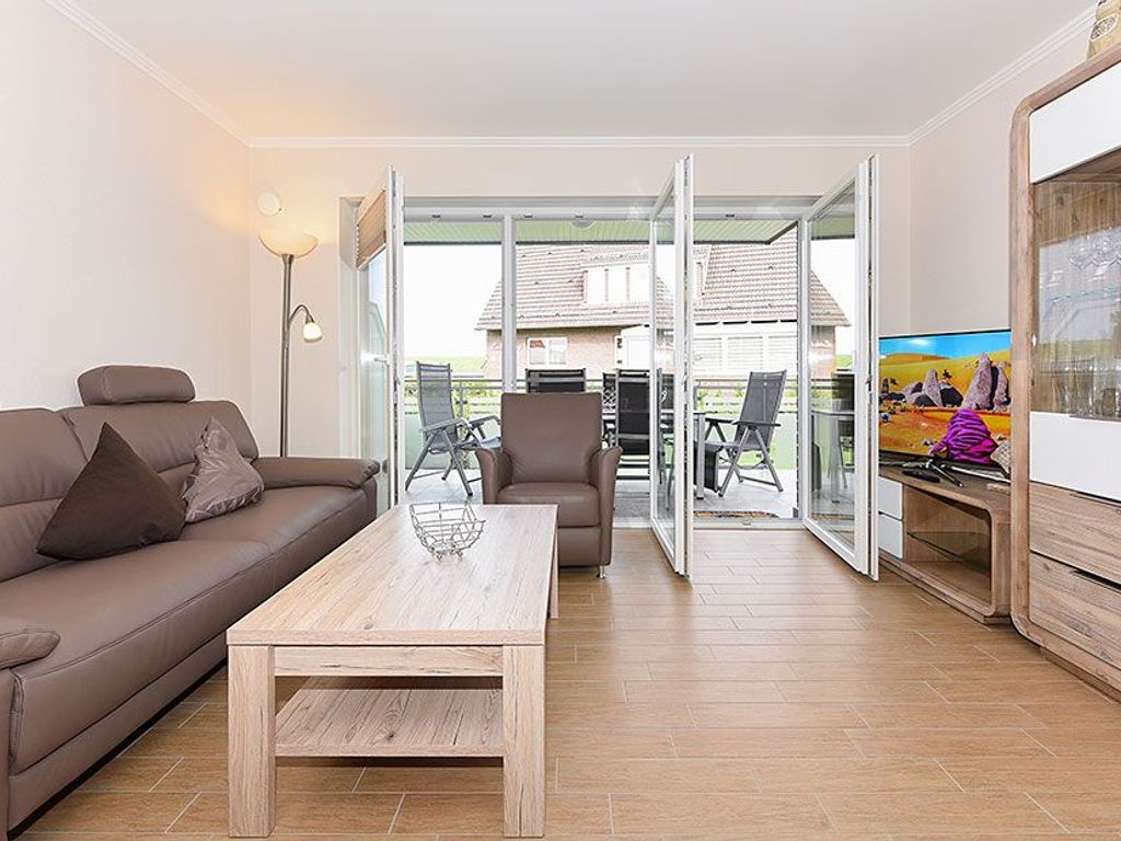 Wohnzimmer mit integriertem Küchenbereich