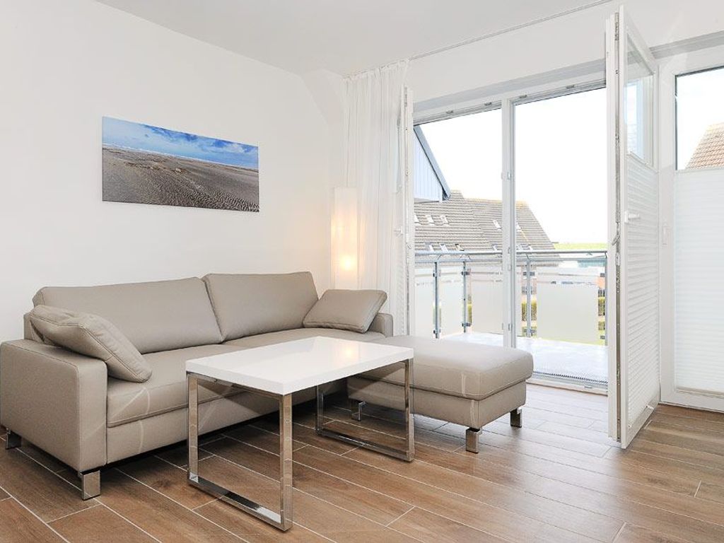 Wohnzimmer mit integriertem Küchenbereich