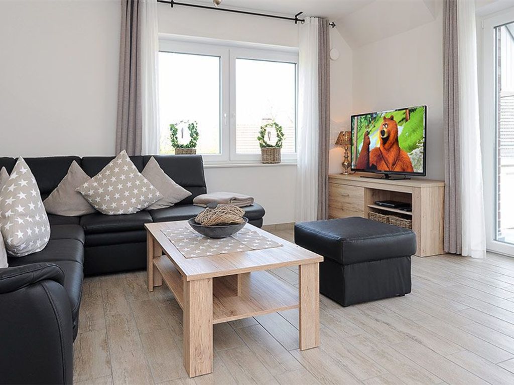 Wohnzimmer mit integriertem Küchenbereich