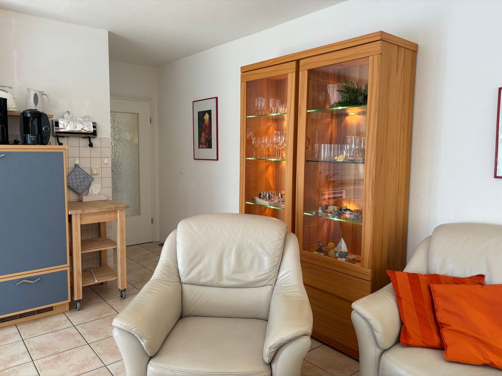 Wohnzimmer mit offener Küche & Essbereich