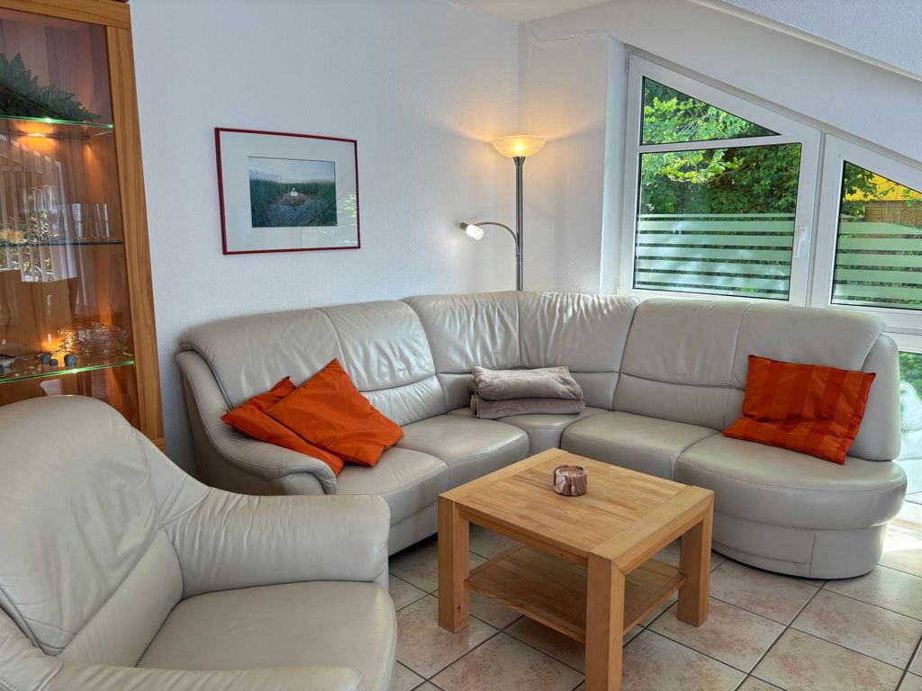 Wohnzimmer mit offener Küche & Essbereich