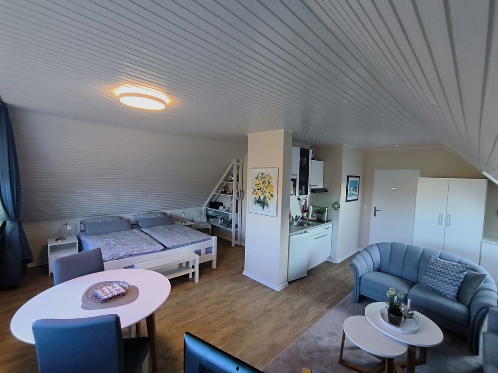 Apartment mit Doppelbett, Sitzecke, Küchenzeile und Duschbad