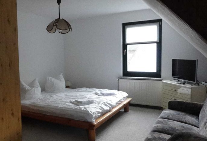 Doppelzimmer 25 m² (Gemeinschaftsbad)