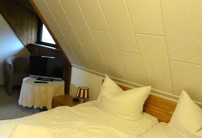 Doppelzimmer 15 m² (Gemeinschaftsbad)