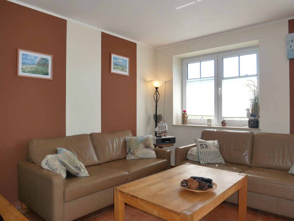 Wohnzimmer mit offener Küche & Essbereich