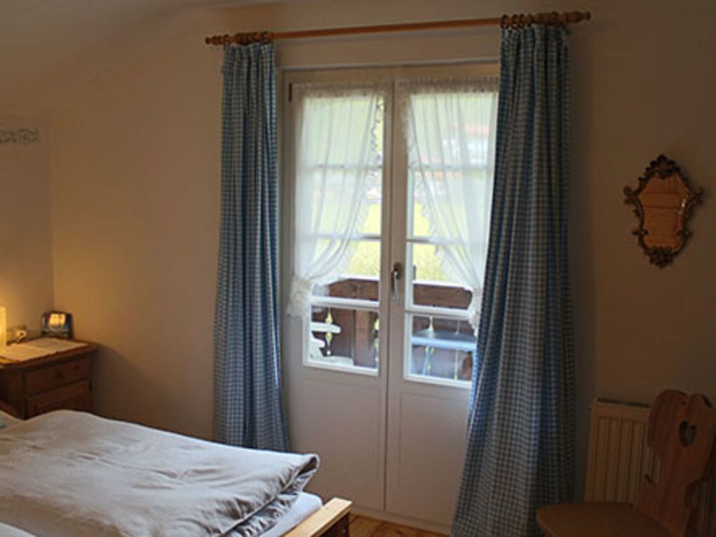 Schlafzimmer mit Balkon