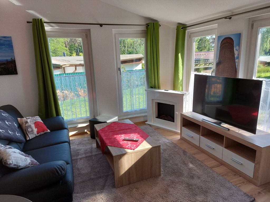 Wohnzimmer  mit  Elektrokamin