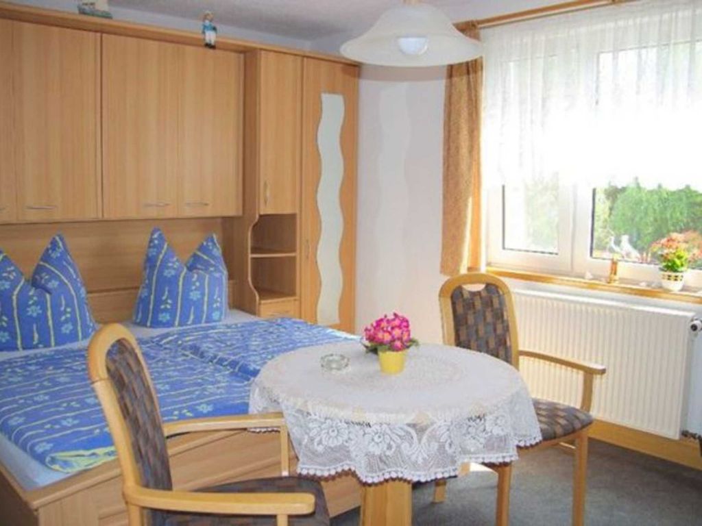 Schlafzimmer mit Sitzecke