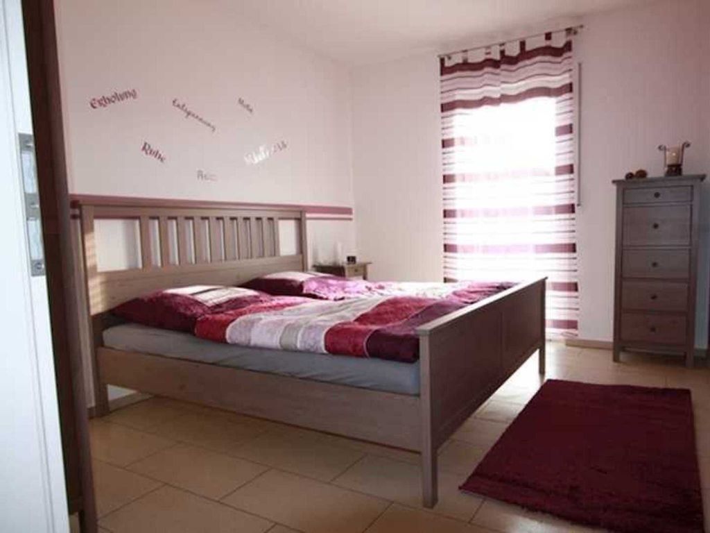 erstes Schlafzimmer mit Doppelbett