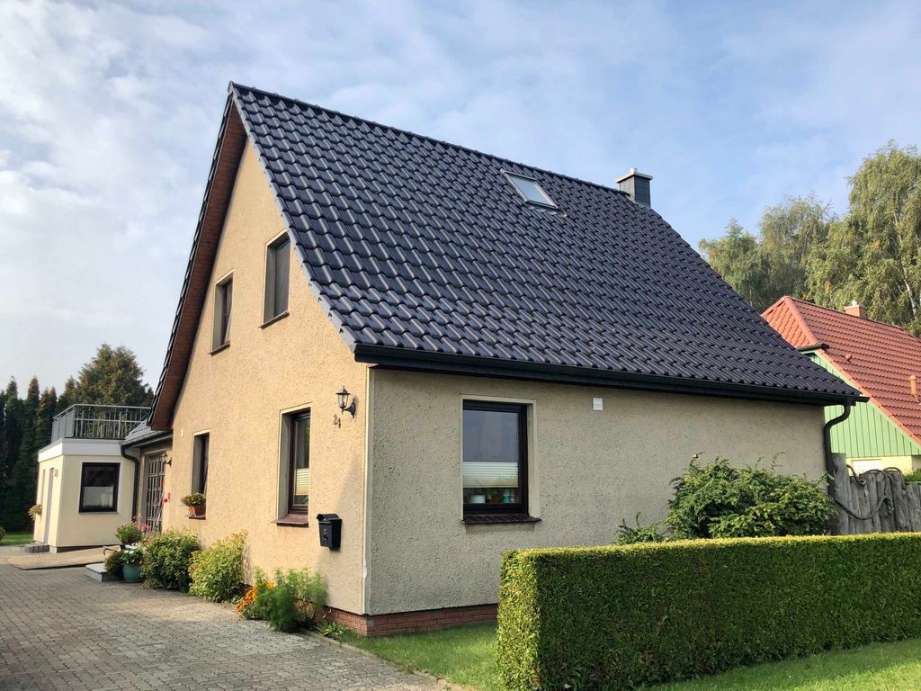 Blick auf das Haus mit der Ferienwohnung Am Norderfeld EG