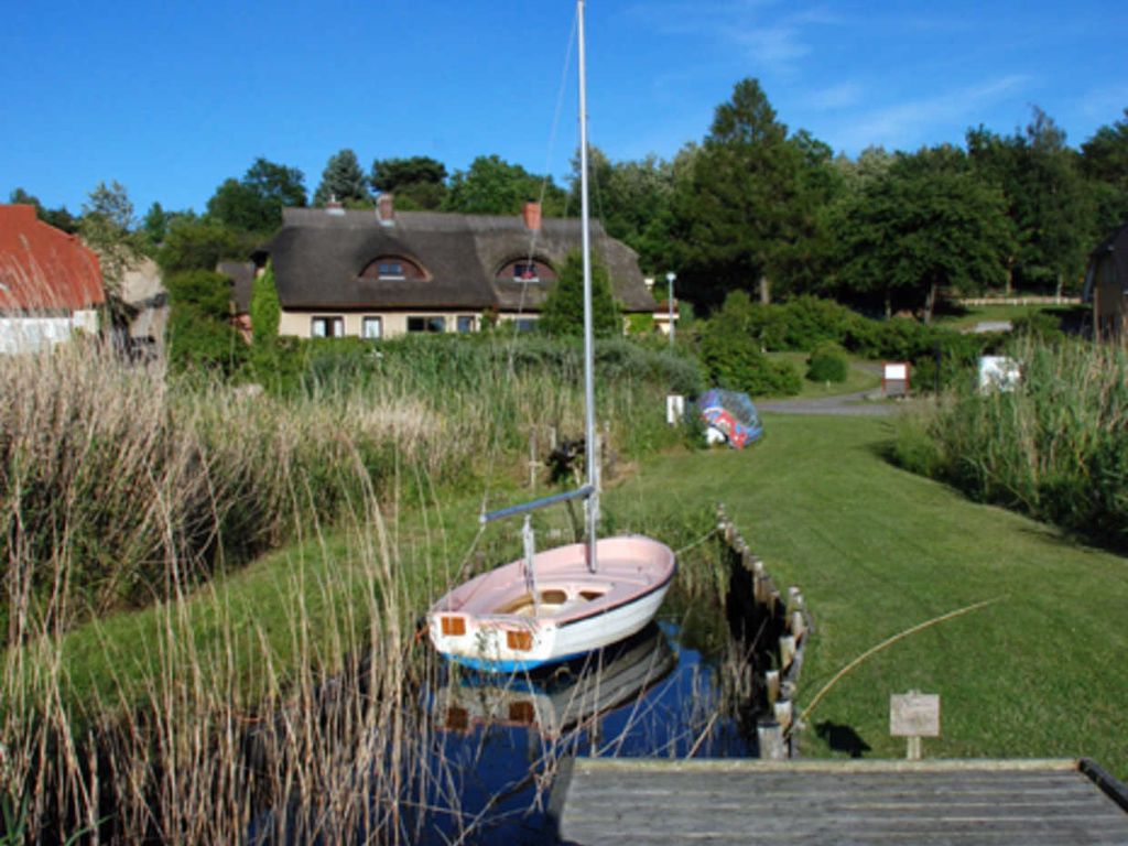 Ferienappartements unterm Reetdach mit Seeblick