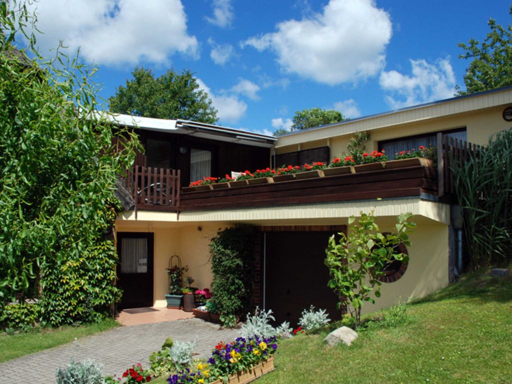 Ferienappartements unterm Reetdach mit Seeblick
