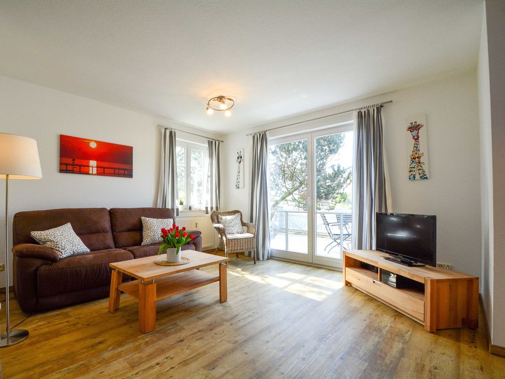 Der Wohnbereich mit Flachbild-TV