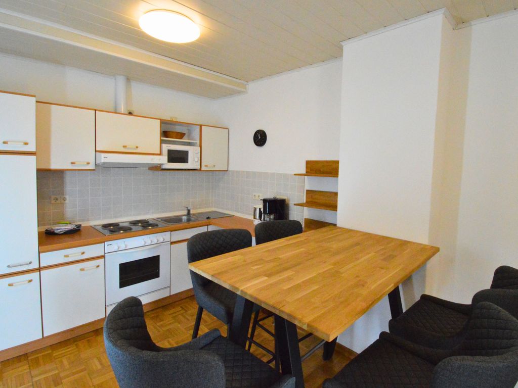 Wohnzimmer mit Küche