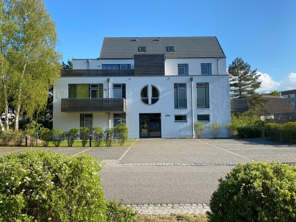 Kapitänsweg 4, Koje 2, Stellplatz vorm Ferienhaus