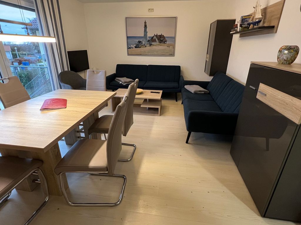 Wohnraum mit 2 x Schlafsofa und Essbereich