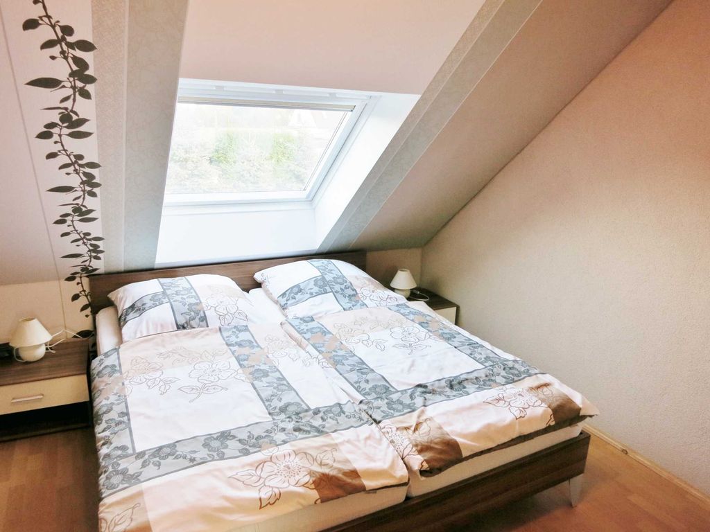 1. Schlafzimmer mit Doppelbett und einen Einzelbett