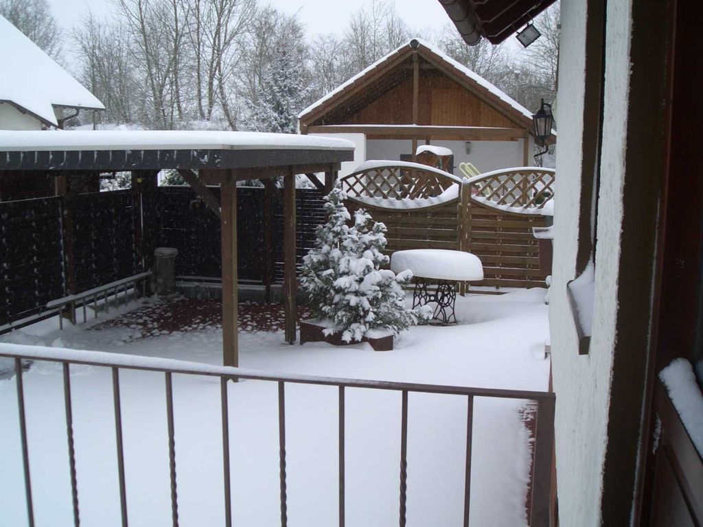 Carport mit Freisitz