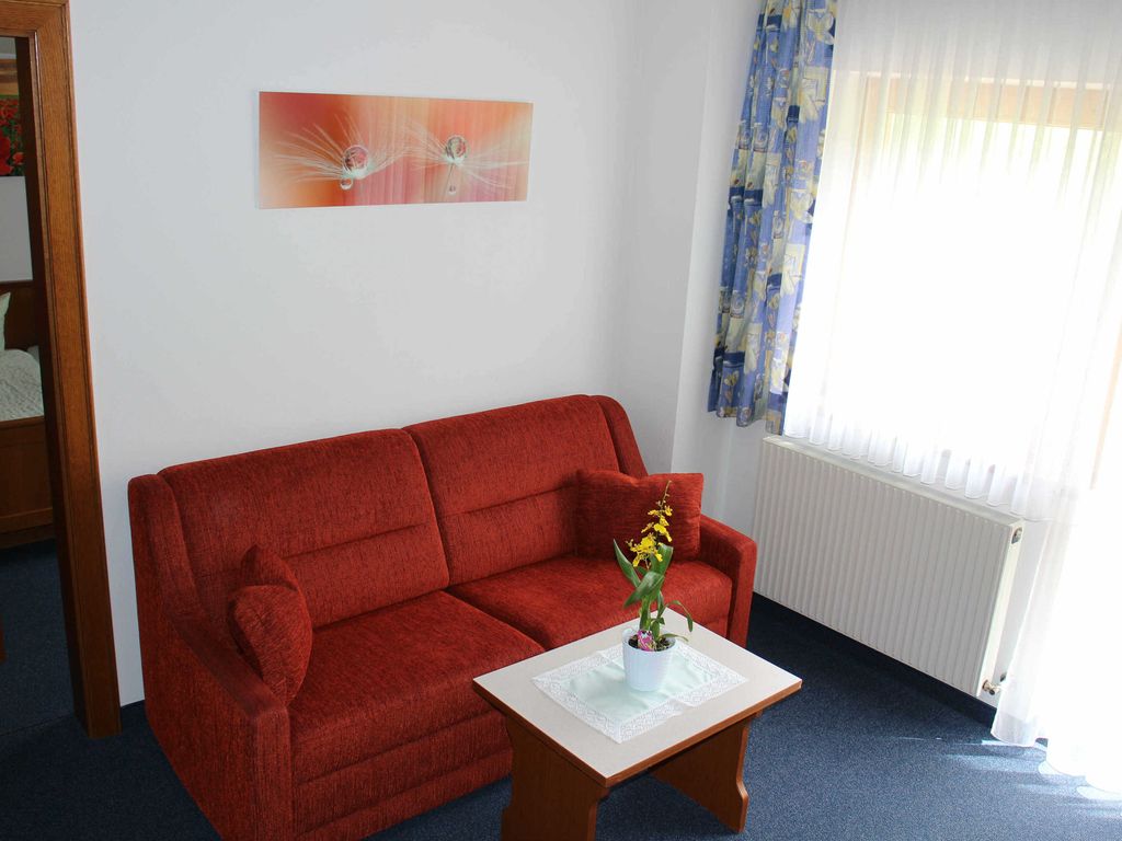 Wohnzimmer von Ferienwohnung Bergkastelblick