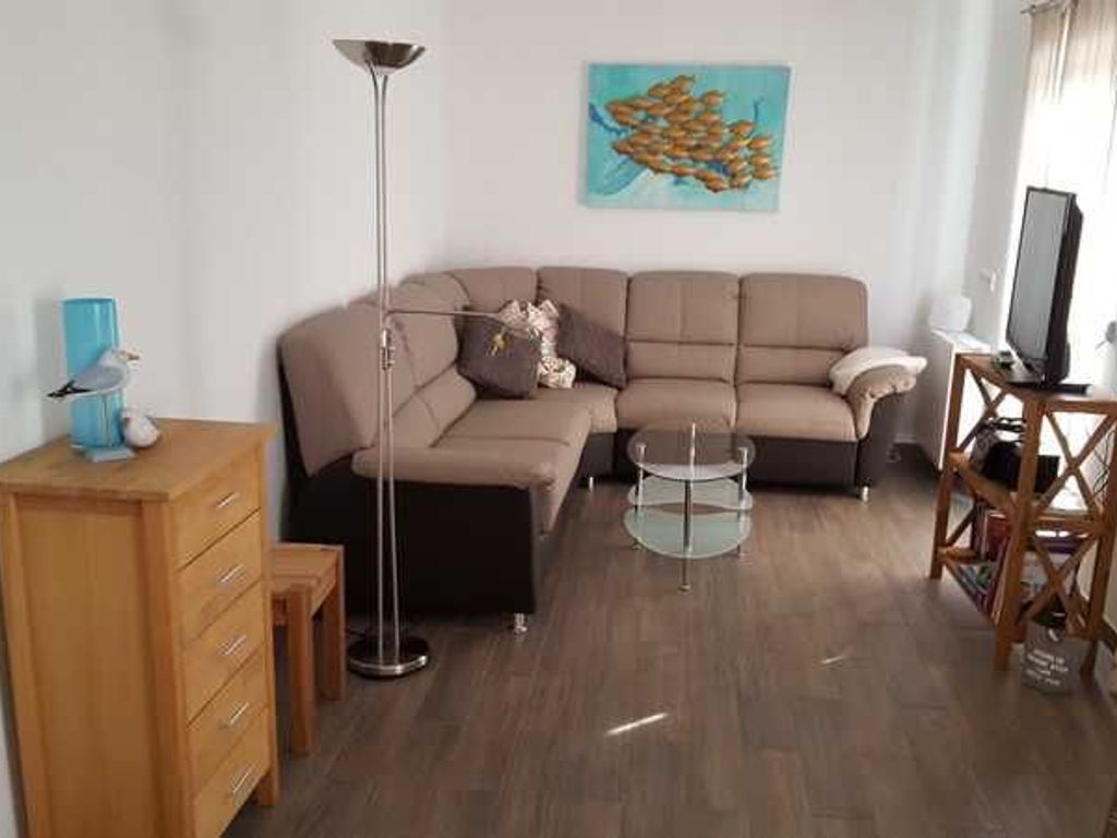 Wohnzimmer mit der großen gemütlichen Sitzgruppe