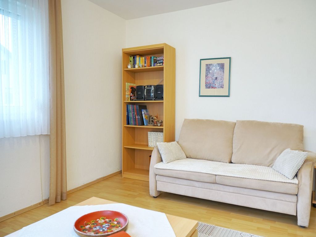 Wohnzimmer mit Schlafsofa