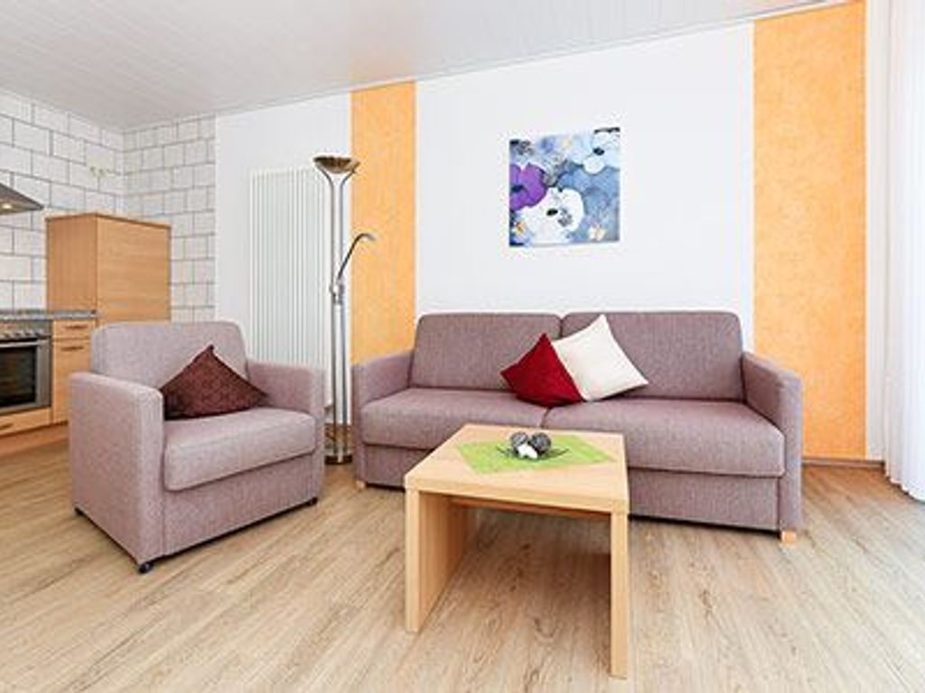 Living room with integrated kitchen area