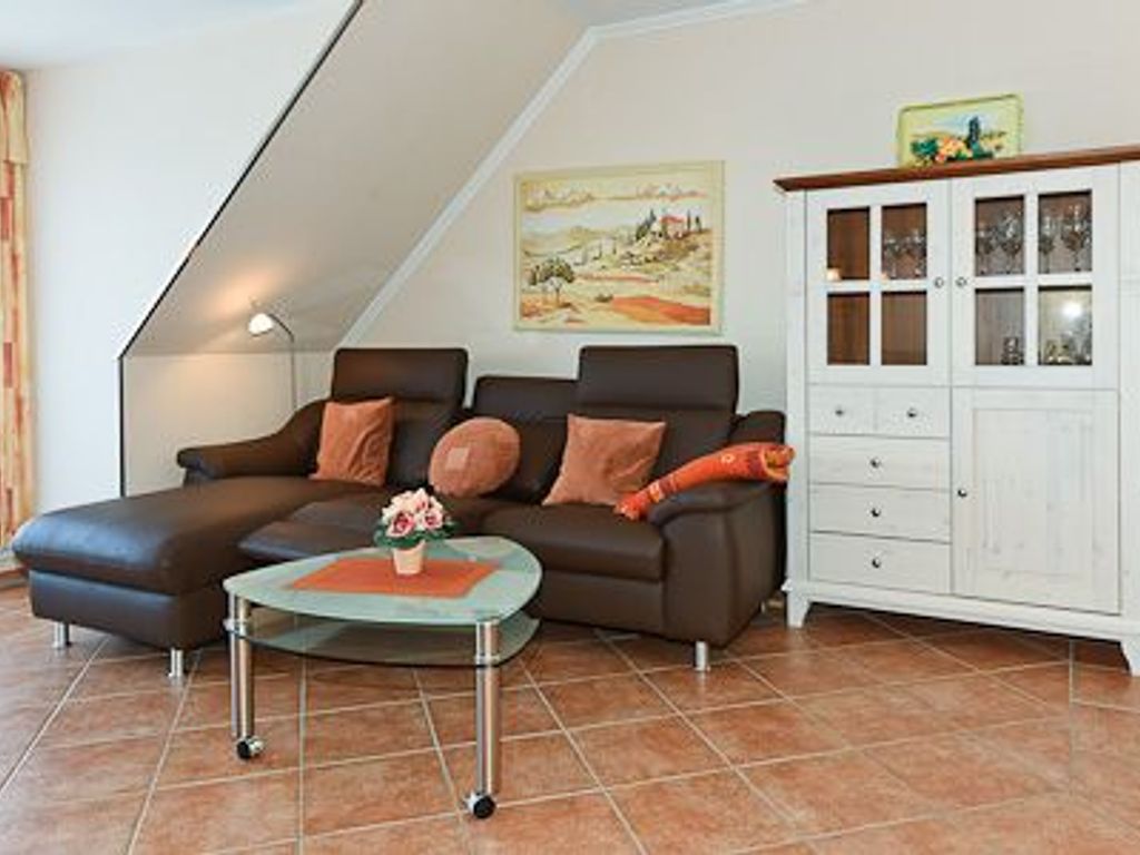 Wohnzimmer mit integriertem Küchenbereich