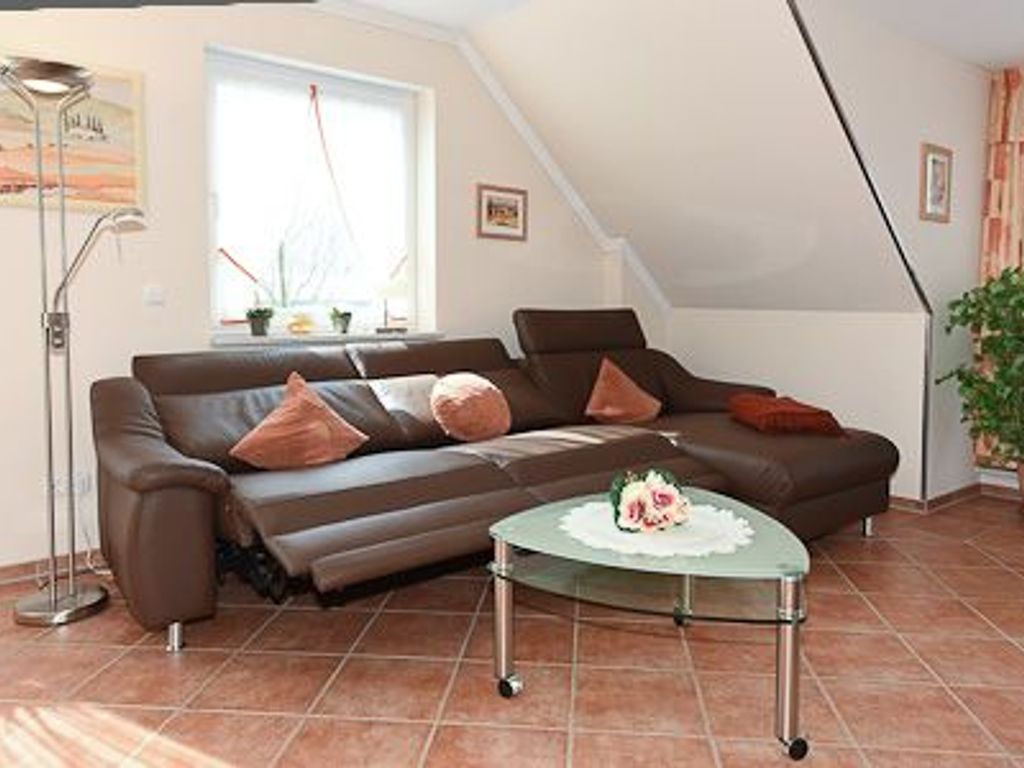 Wohnzimmer mit integriertem Küchenbereich