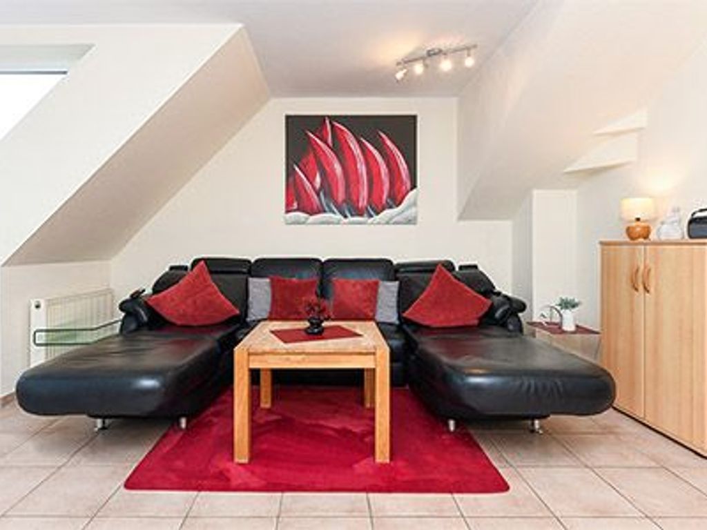 Wohnzimmer mit integriertem Küchenbereich