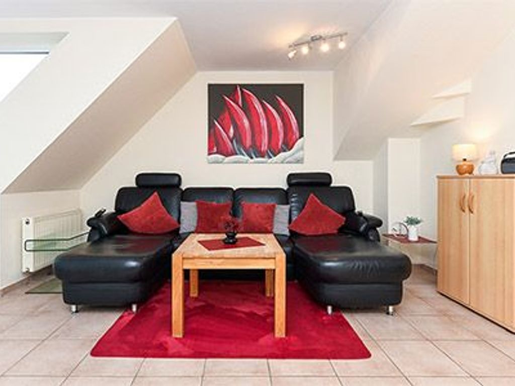 Wohnzimmer mit integriertem Küchenbereich