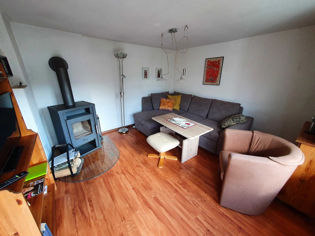 Wohnzimmer mit Kamin
