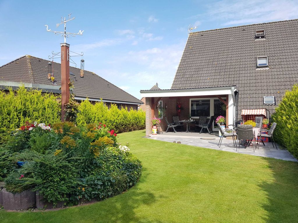 Garten mit überdachter Terrasse