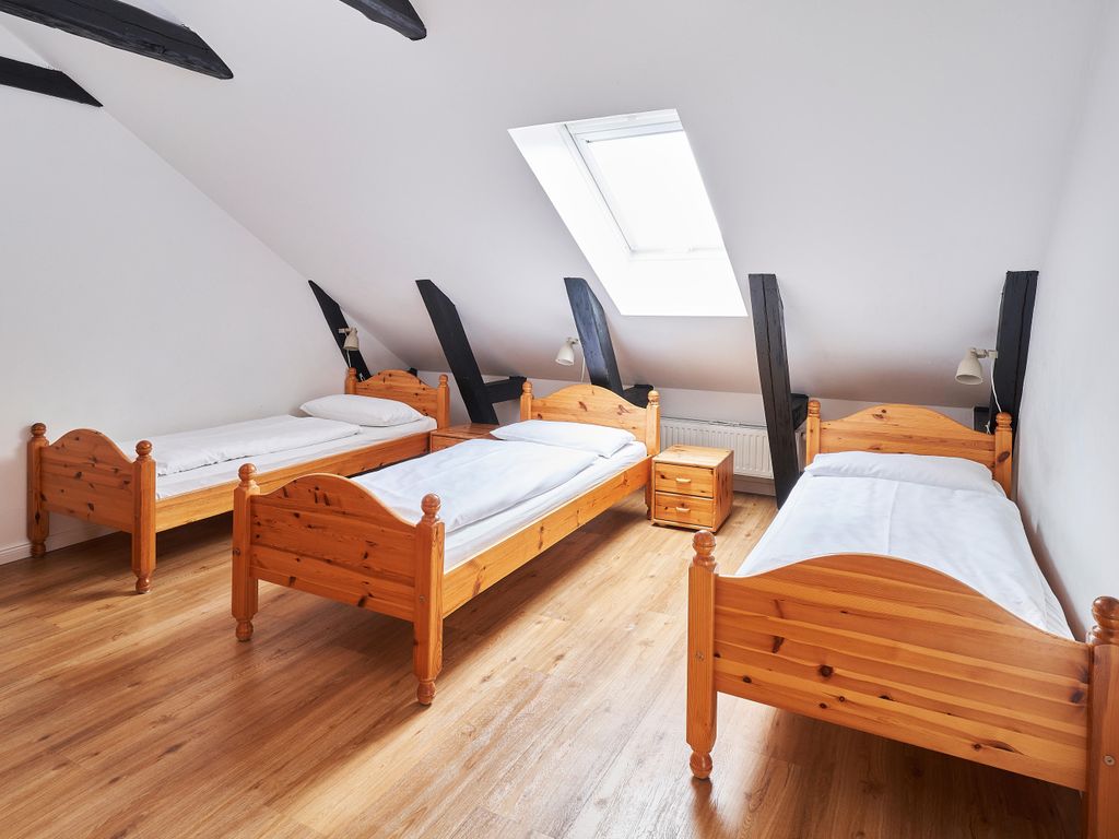 Schlafzimmer mit 3 Einzelbetten