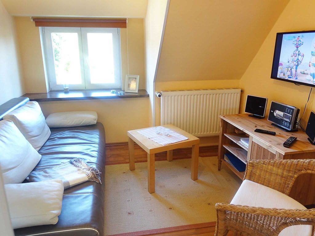 Kuscheliger Wohnbereich mit Schlafsofa