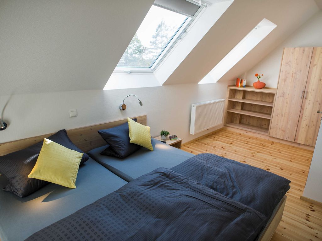 Schlafzimmer im Ferienhaus, Foto: Foto- & Werbestudio Metzner