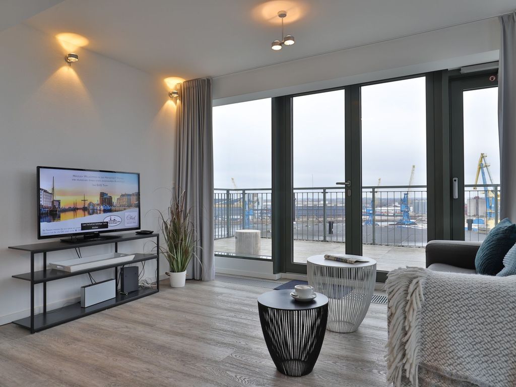 Ohlerich Speicher App.47 - Blick auf den offenen Wohnbereich mit Fernseher