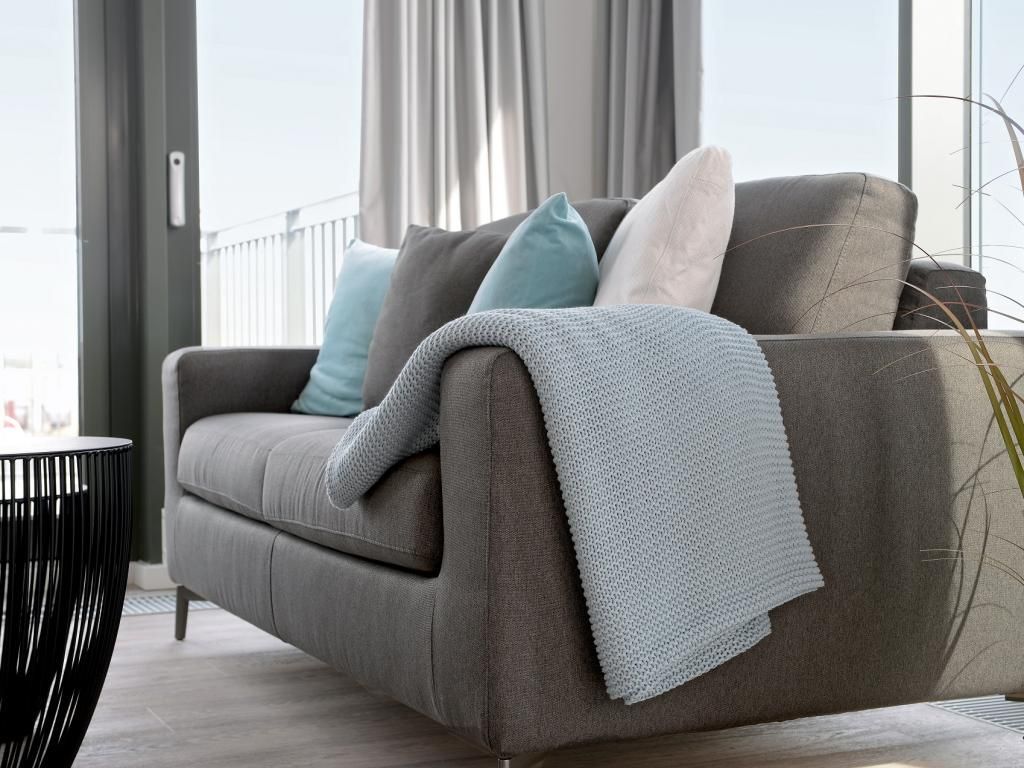 Ohlerich Speicher App.47 - Wohnbereich mit gemütlichem Sofa
